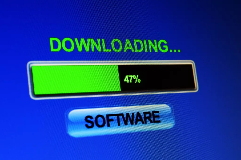 a Close-up of a Blue Computer Screen Displaying a Progress Bar at 47% Completion with the Text "downloading... Saas" Above It.