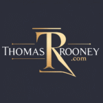 Logo with Large Gold "tr" in the Center and "thomas Rooney.com" in White and Gold Text on a Dark Background.